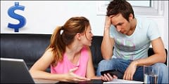 man and woman talking about money